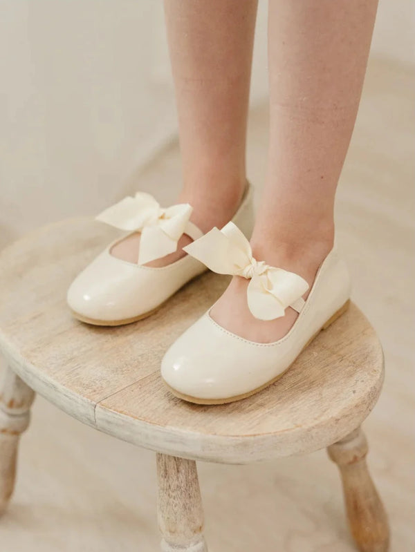 Amelia Bow Flat- Patent Cream